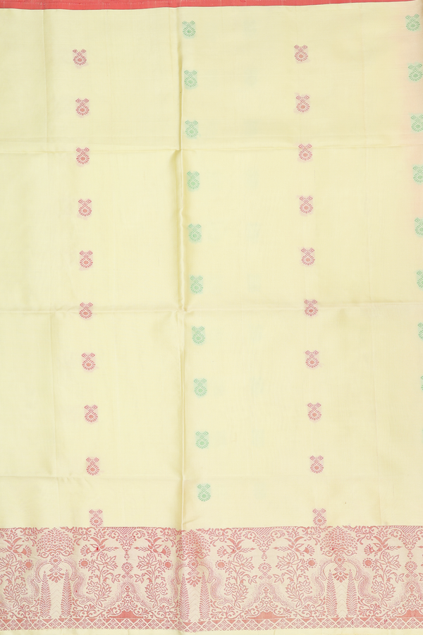 Soft Silk Saree In Pastel Yellow With Threadwork Floral Buttas
