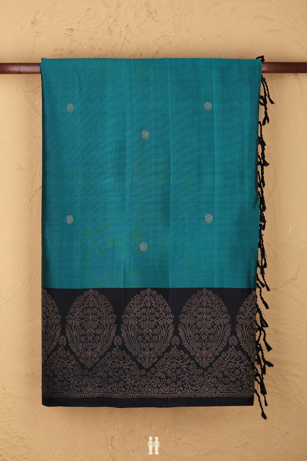 Soft Silk Saree In Peacock Green With Floral Buttas