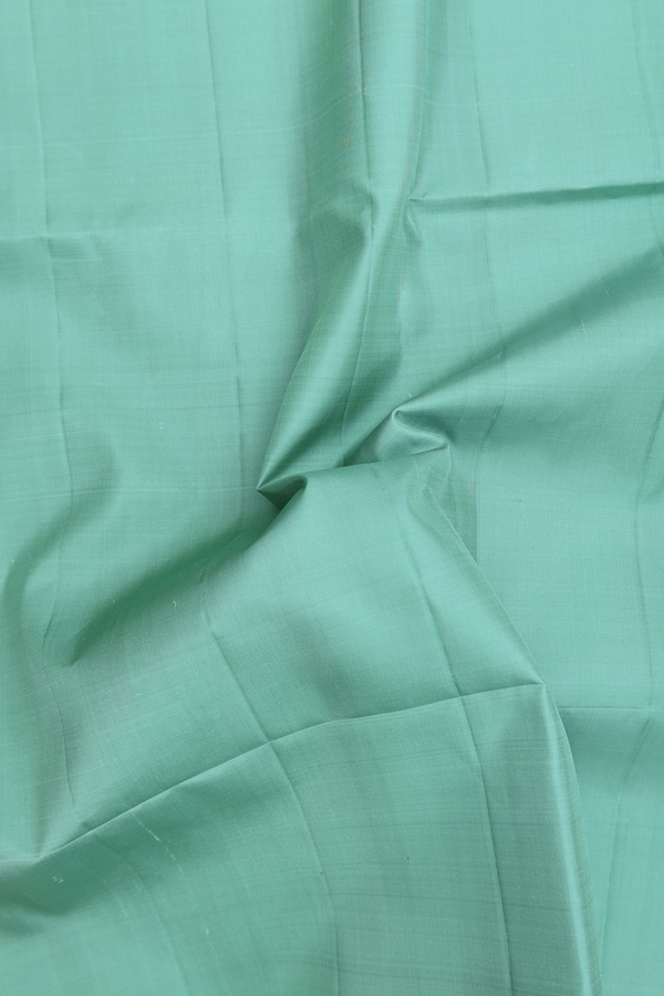 Soft Silk Saree In Plain Green With Stripes Border