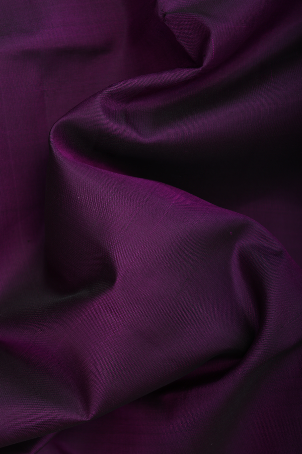 Soft Silk Saree In Plum Purple With Temple Border