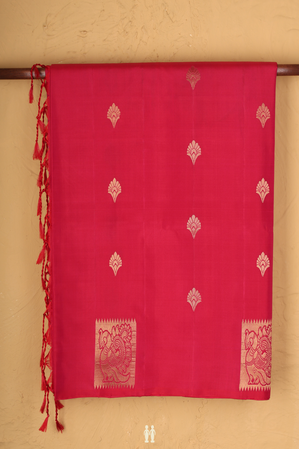 Soft Silk Saree In Rani Pink With Floral Buttas