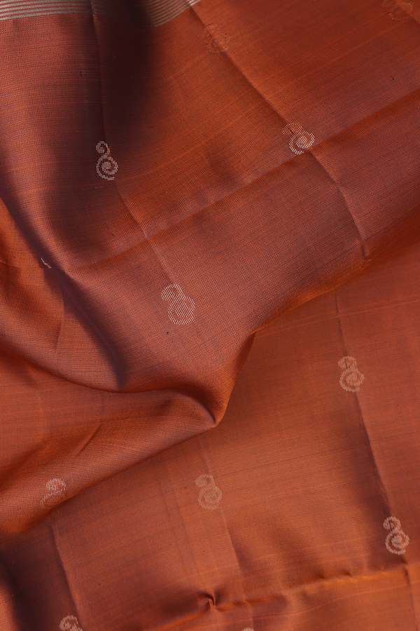 Soft Silk Saree In Rust Orange With Zari Buttas