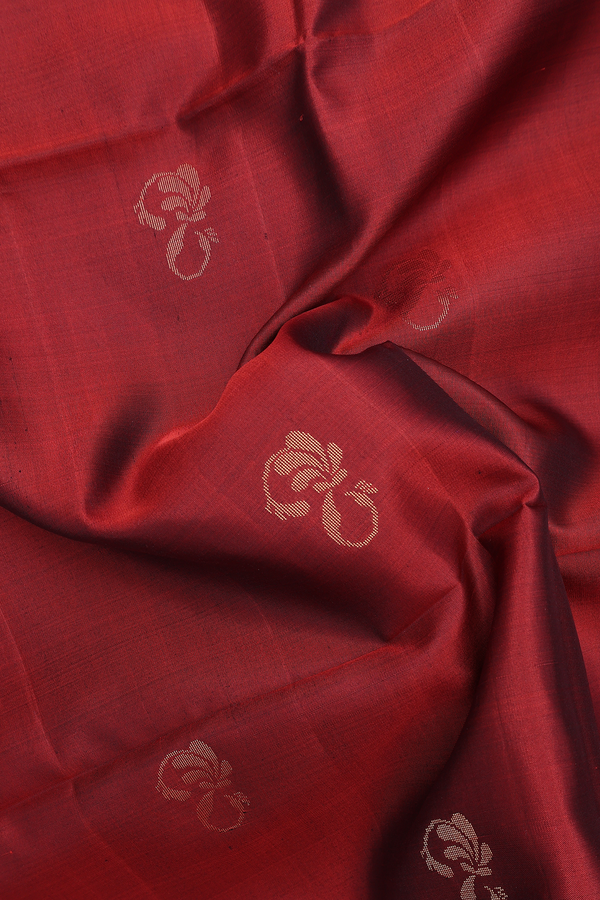 Soft Silk Saree In Rust Red With Zari Buttas