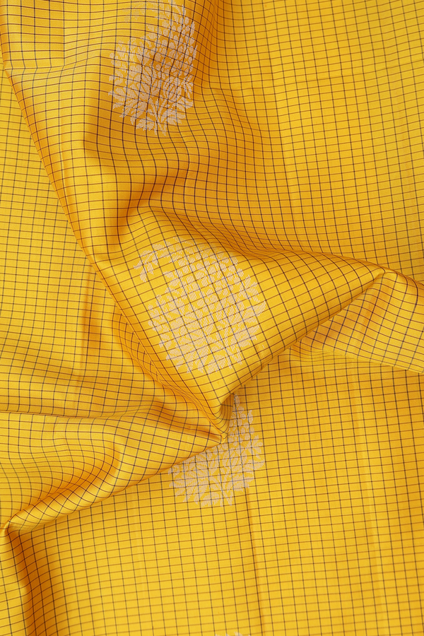 Soft Silk Saree In Saffron Yellow With Checks Design