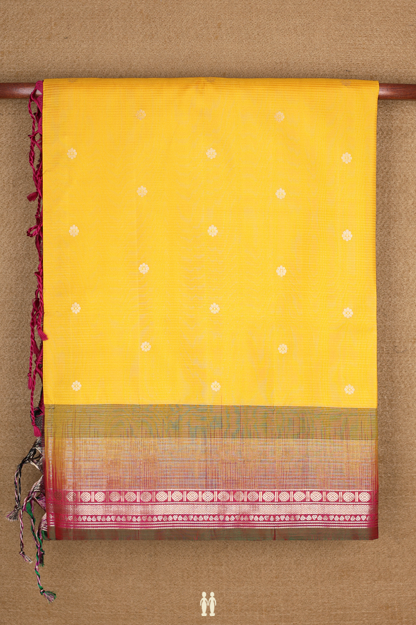 Soft Silk Saree In Saffron Yellow With Floral Buttas