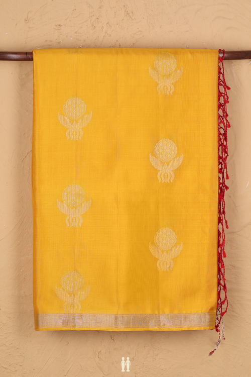 Soft Silk Saree In Saffron Yellow With Floral Buttas