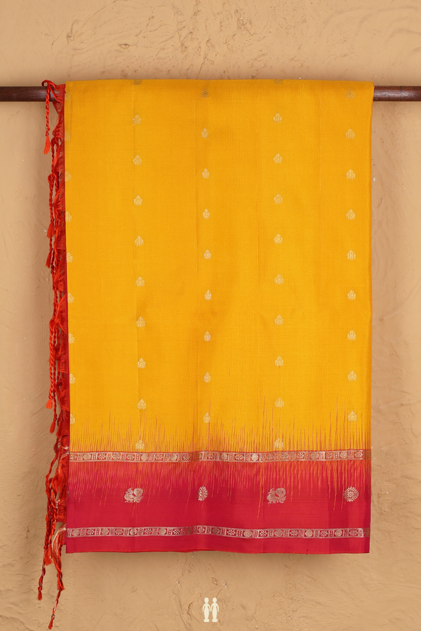 Soft Silk Saree In Saffron Yellow With Floral Buttis