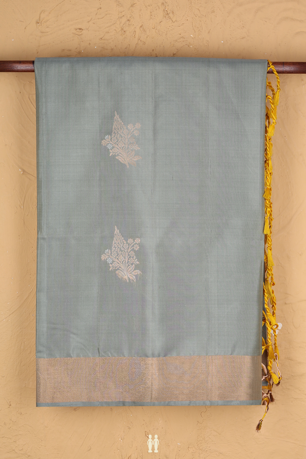 Soft Silk Saree In Sage Green With Floral Buttas