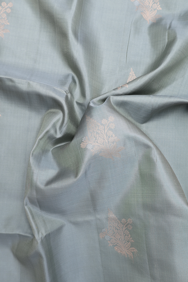Soft Silk Saree In Sage Green With Floral Buttas