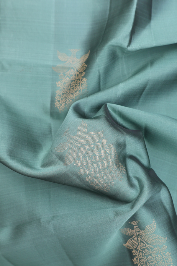 Soft Silk Saree In Sage Green With Floral Motifs