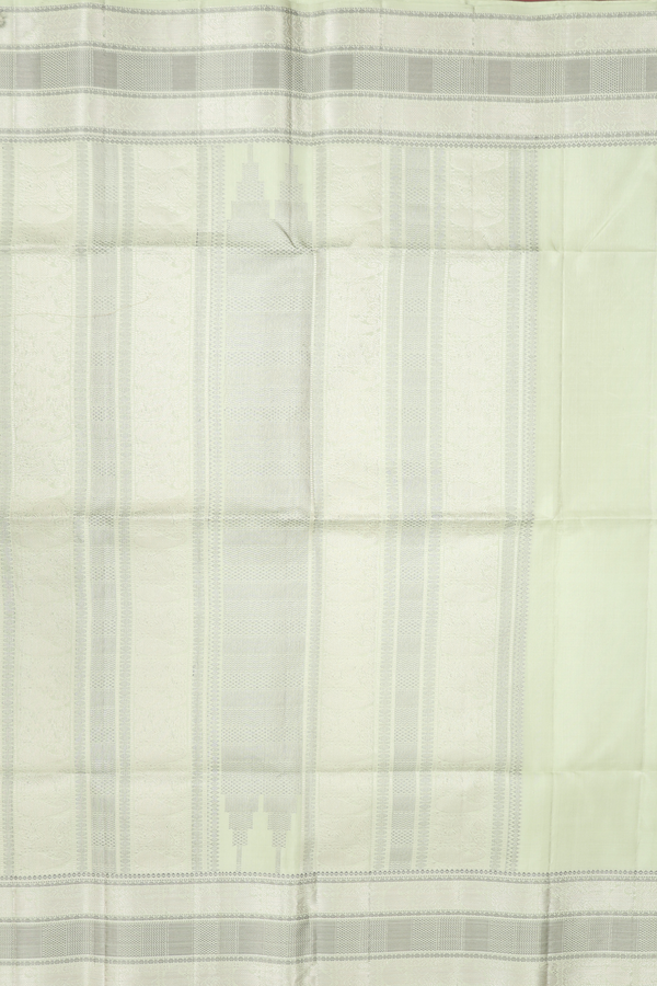 Soft Silk Saree In Pastel Green With Peacock Buttas
