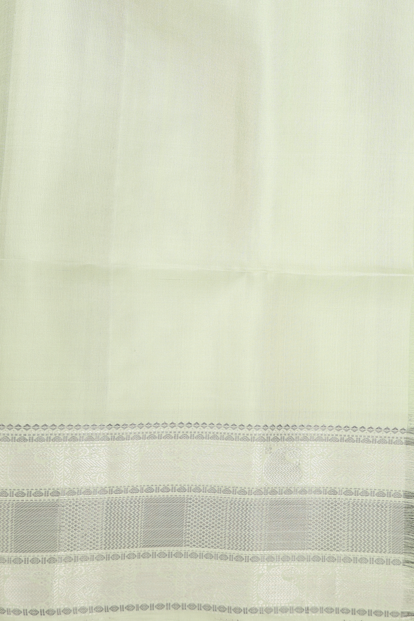 Soft Silk Saree In Pastel Green With Peacock Buttas