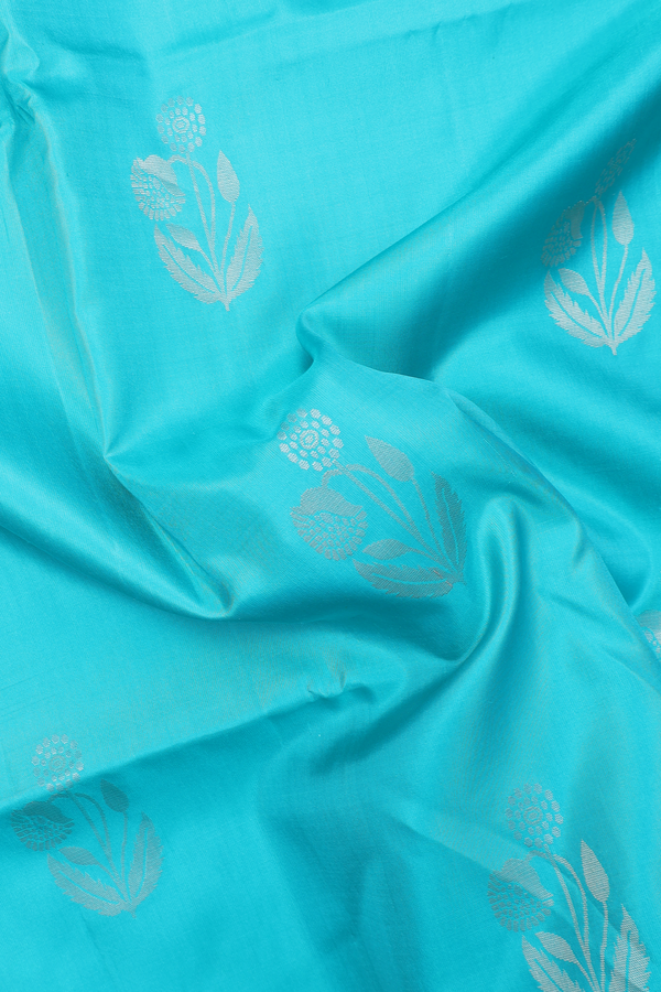 Soft Silk Saree In Turquoise Blue With Floral Motifs