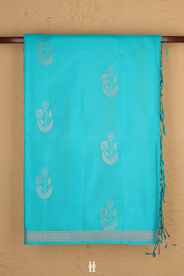 Soft Silk Saree In Turquoise Blue With Floral Motifs
