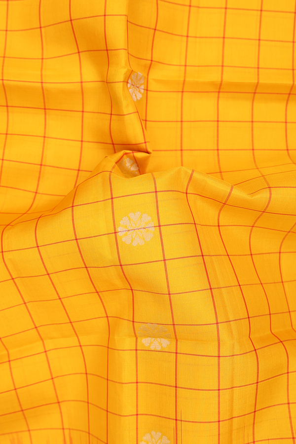 Soft Silk Saree In Yellow With Checks Design