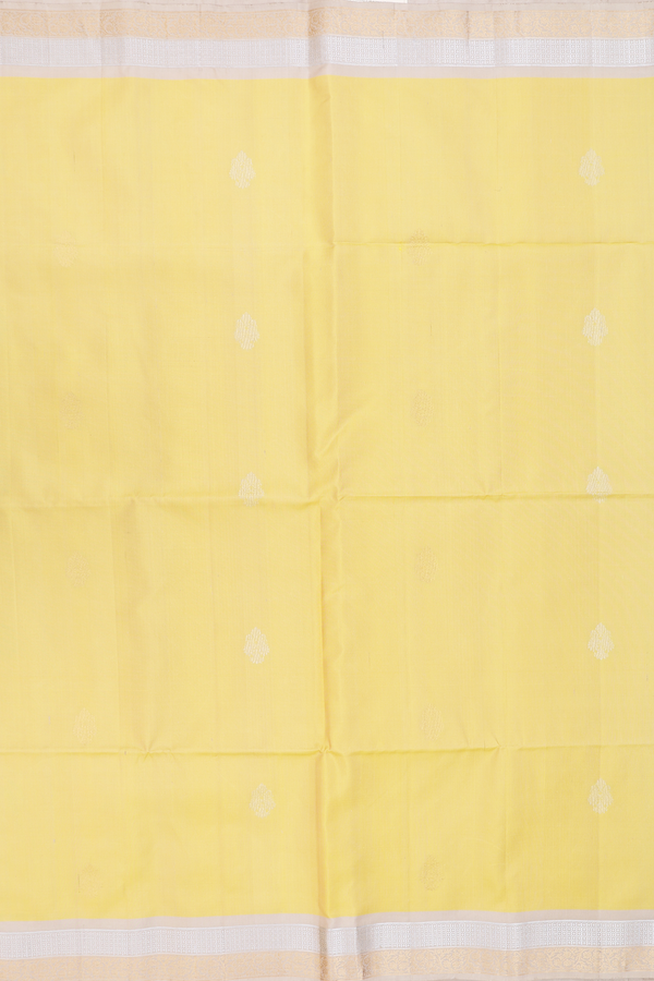 Soft Silk Saree In Yellow With Floral Buttas