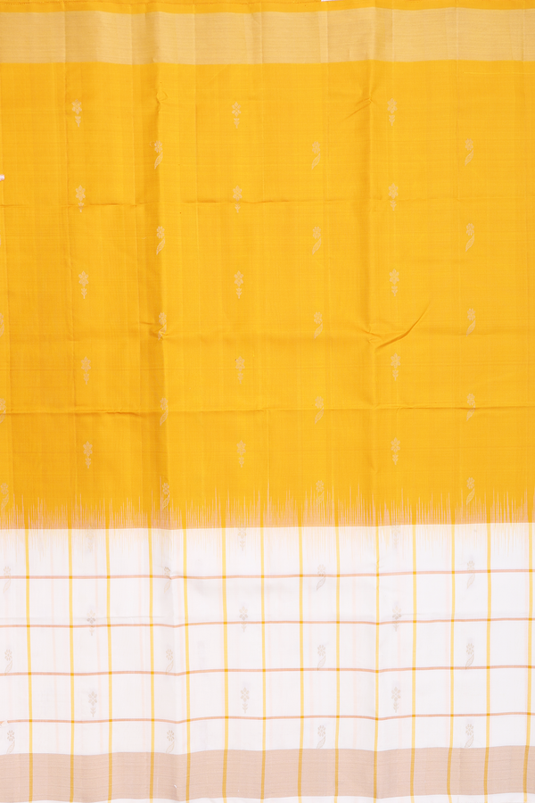 Soft Silk Saree In Yellow With Floral Buttas