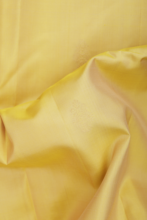 Soft Silk Saree In Yellow With Floral Buttas