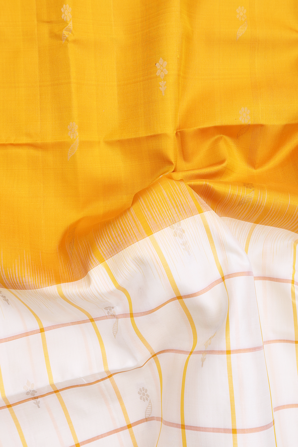 Soft Silk Saree In Yellow With Floral Buttas