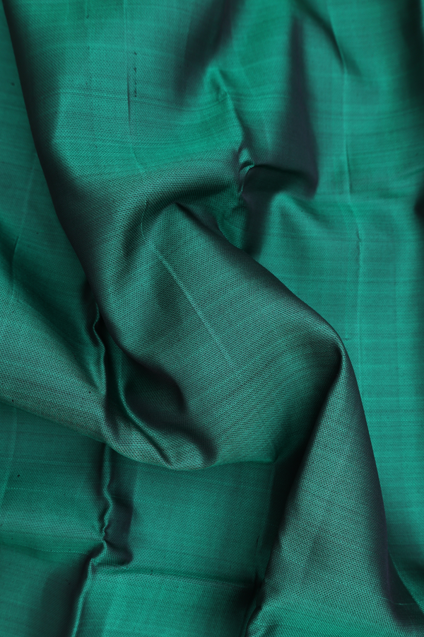 Kanchipuram Silk Saree In Emerald Green With Zari Border