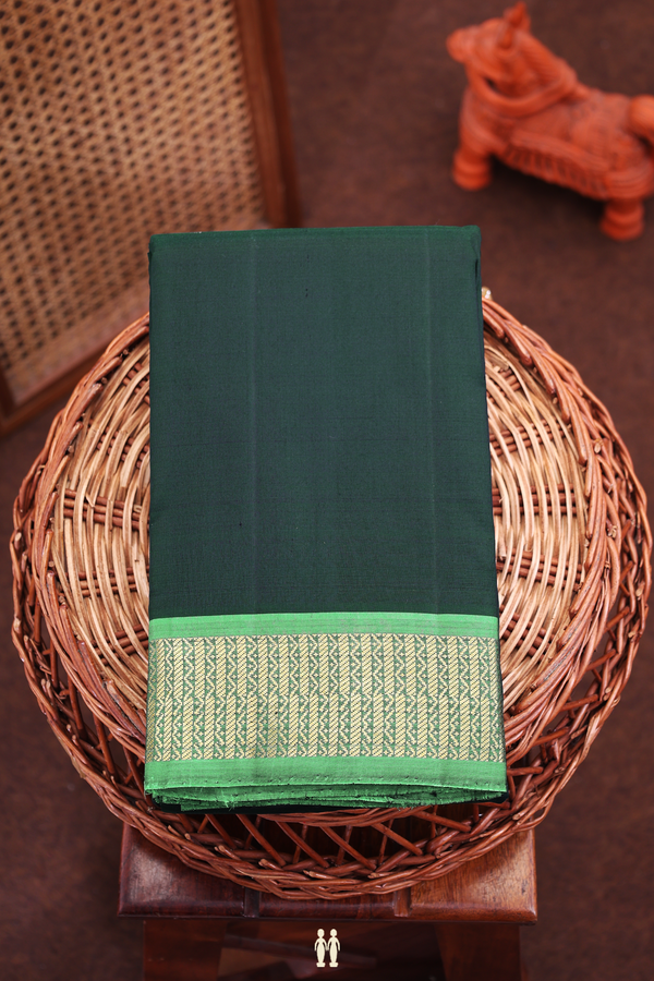 Kanchipuram Silk Saree In Bottle Green With Zari Border