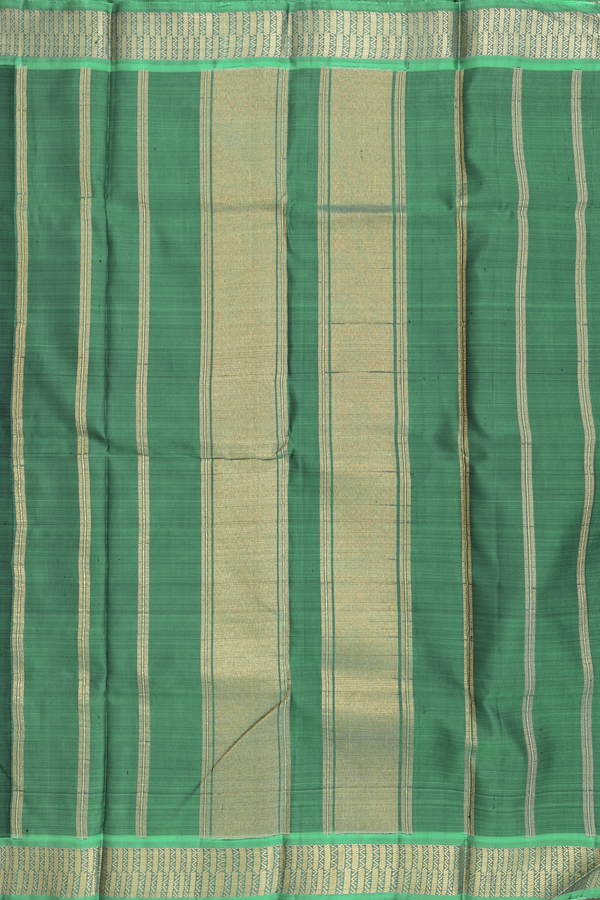 Kanchipuram Silk Saree In Bottle Green With Zari Border