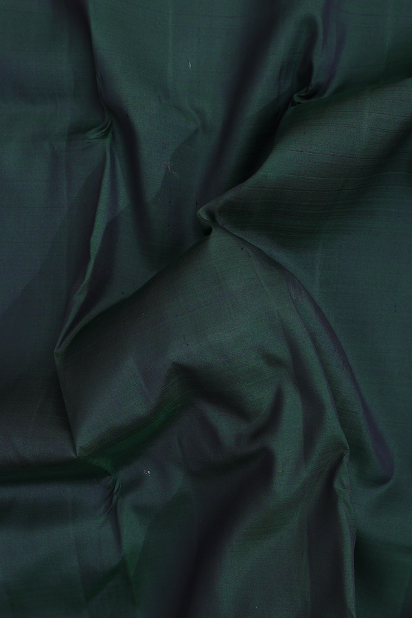 Kanchipuram Silk Saree In Bottle Green With Zari Border