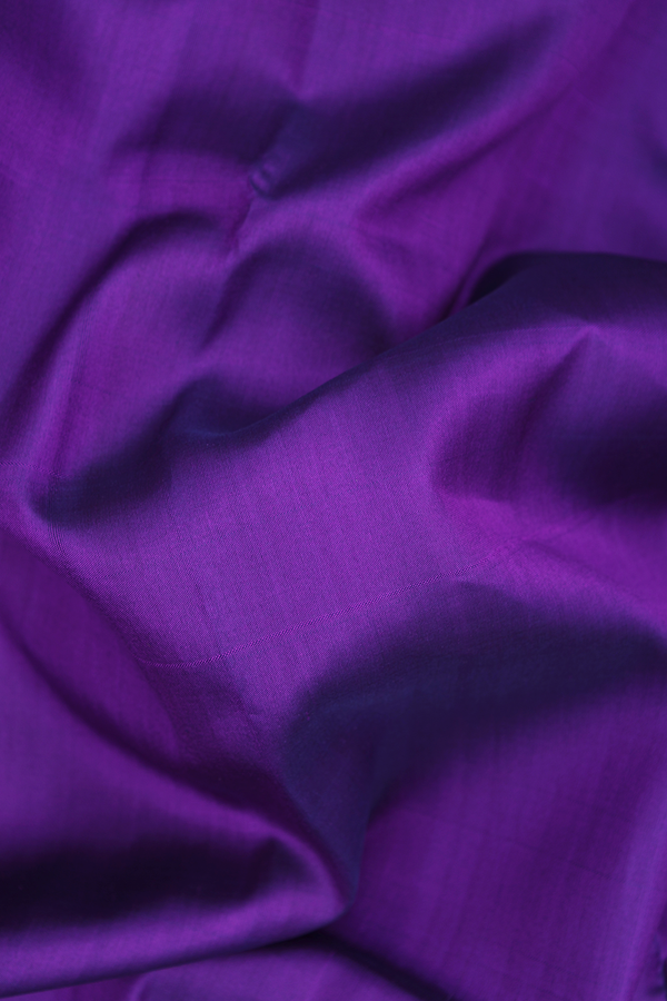 Kanchipuram Silk Saree In Plain Purple With Zari Border