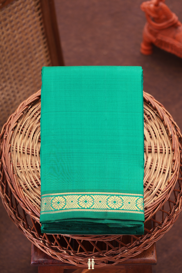 Kanchipuram Silk Saree In Peacock Green With Zari Border