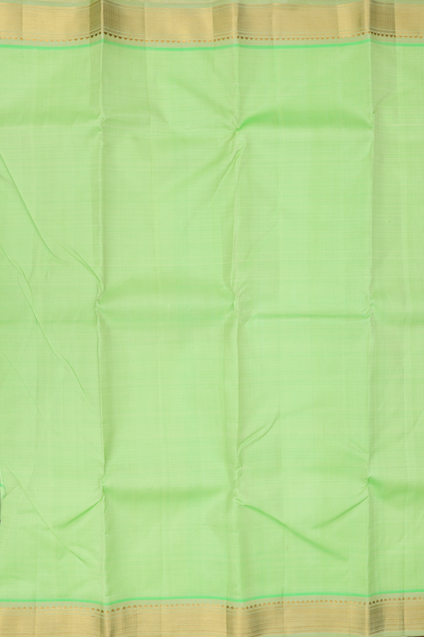 Kanchipuram Silk Saree In Pastel Green With Zari Border