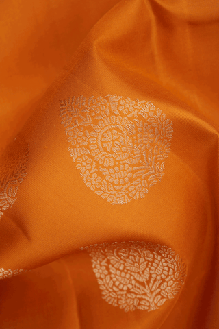 Thilagam Zari Buttas Ochre Orange Kanchipuram Silk Saree