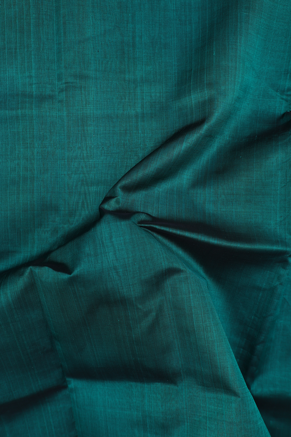 Traditional Silk Cotton Saree In Green With Peacock Border