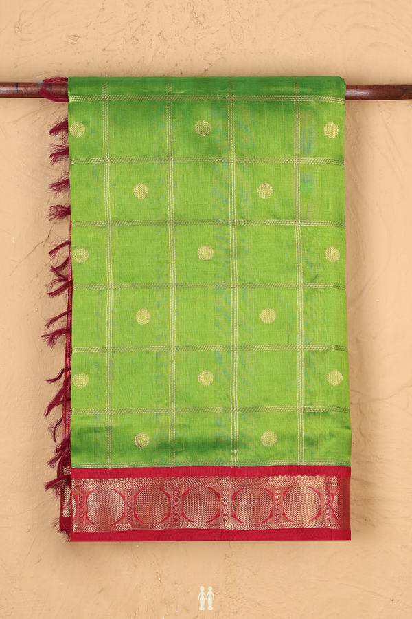 Traditional Silk Cotton Saree In Green Along Checks With Buttas