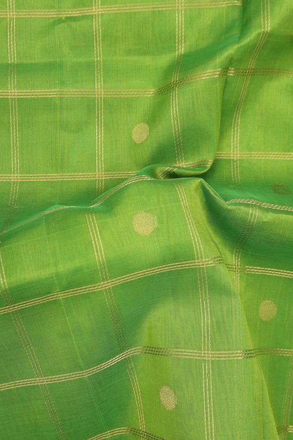 Traditional Silk Cotton Saree In Green Along Checks With Buttas