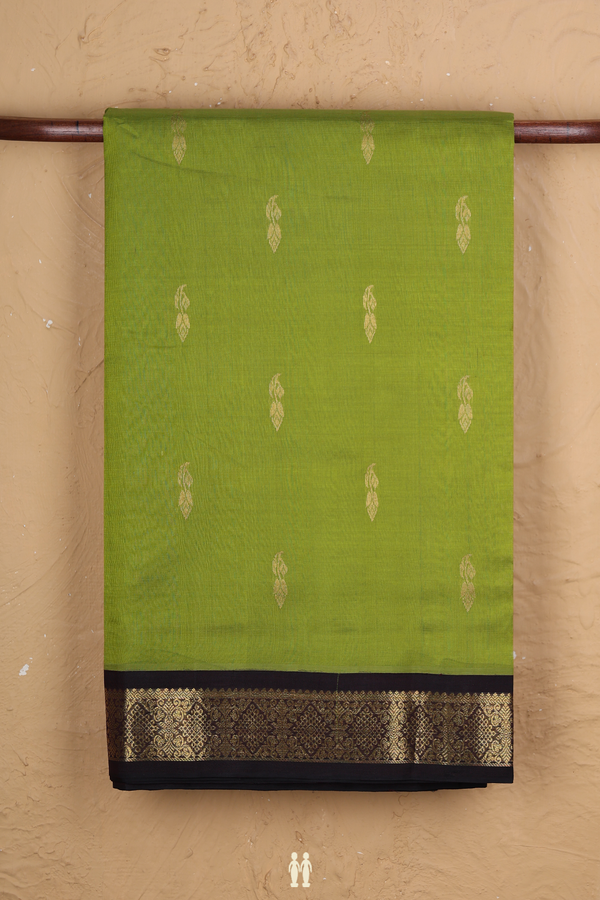 Traditional Silk Cotton Saree In Green With Zari Buttas