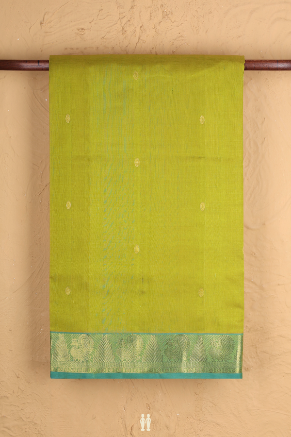 Traditional Silk Cotton Saree In Pear Green With Zari Buttas