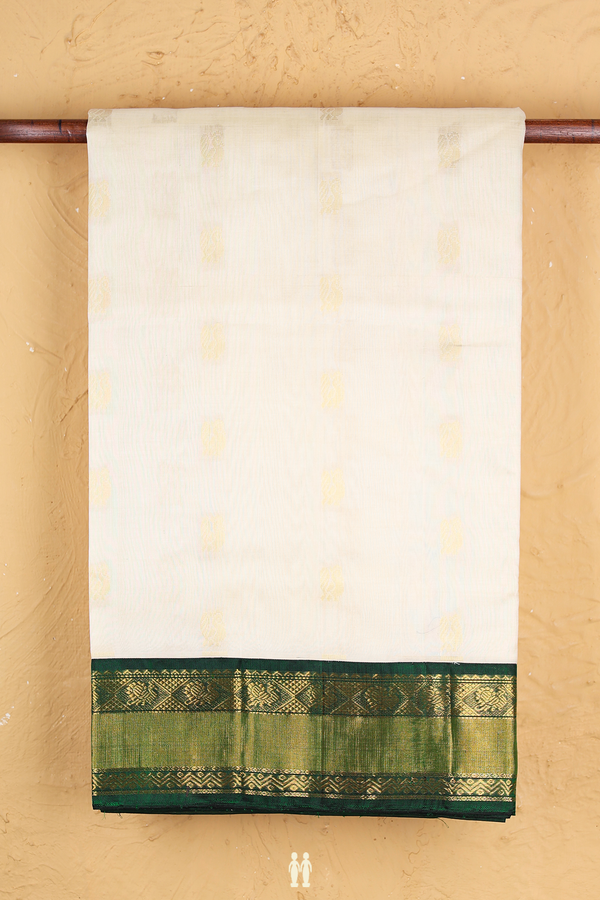 Traditional Silk Cotton Saree In White With Peacock Buttas