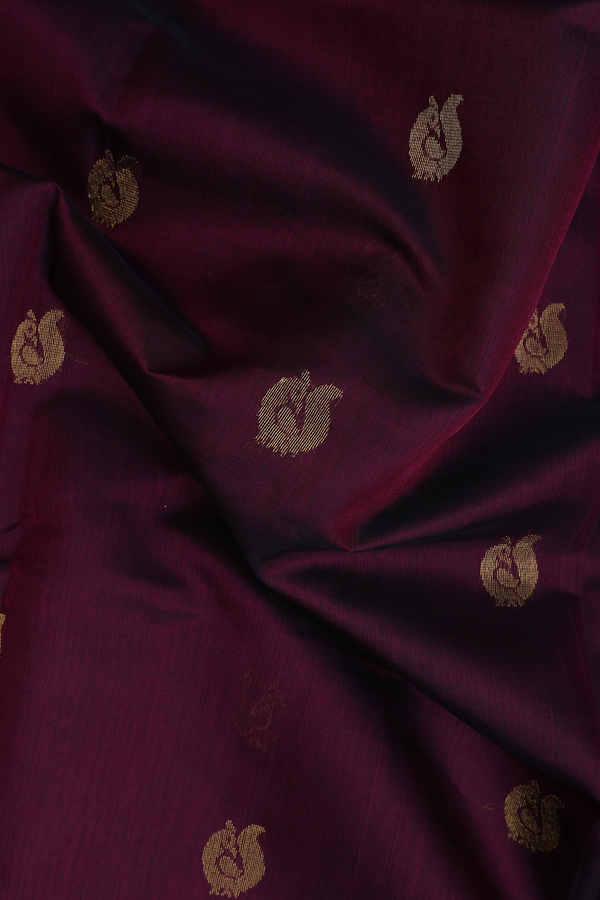 Silk Cotton Saree In Maroonish Purple With Peacock Buttas