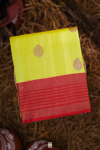 Tussar Banarasi Silk Saree In Green And Orange With Motifs