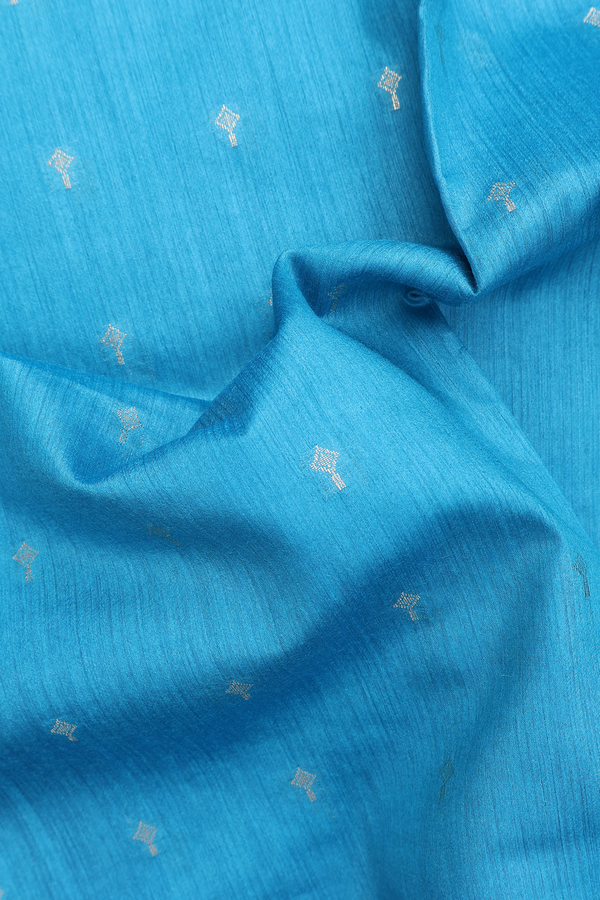 Tussar Silk Saree In Blue With Zari Buttas