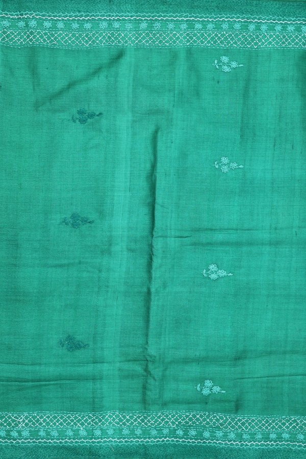 Tussar Silk Saree In Green With Floral Embroidered Buttas