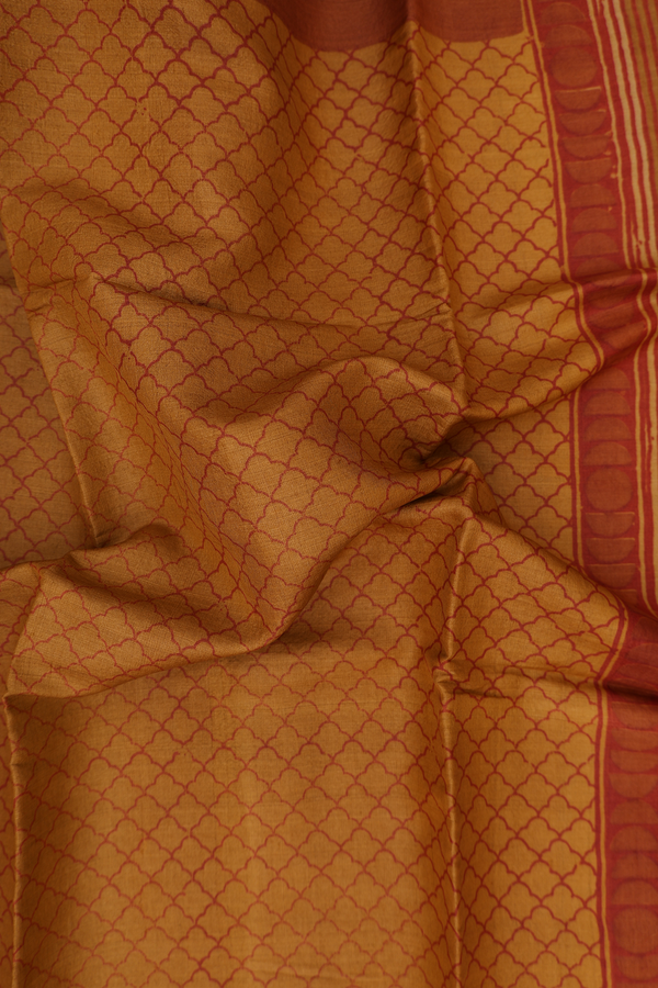 Tussar Silk Saree In Ochre Orange With Scallop Design