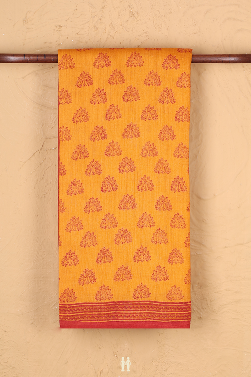 Tussar Silk Saree In Orange With Floral Buttas