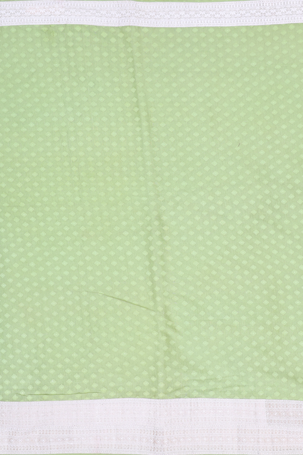 Tussar Silk Saree In Pastel Green With Threadwork Buttas