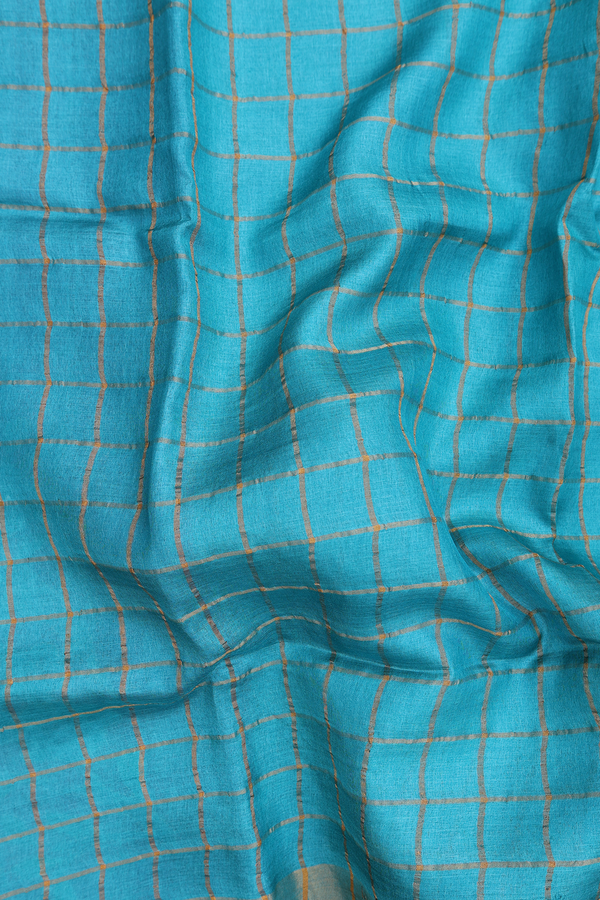 Tussar Silk Saree In Peacock Blue With Checks Design