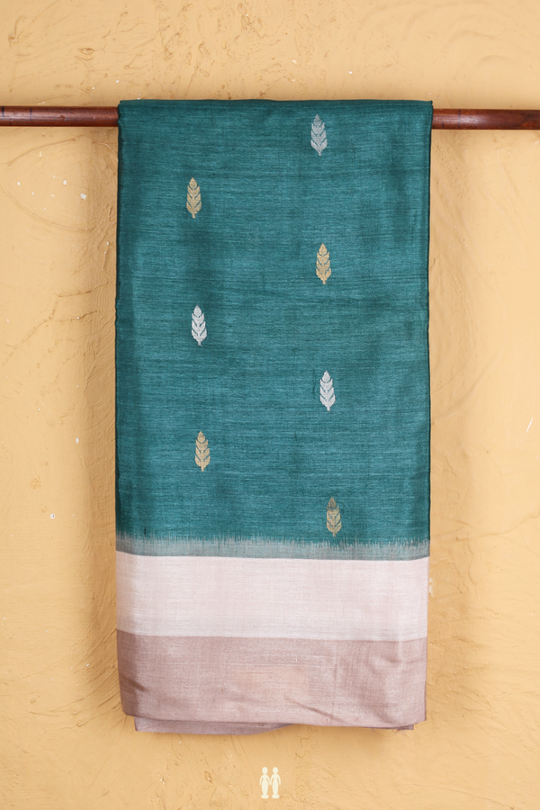 Tussar Silk Saree In Pine Green With Zari Buttas