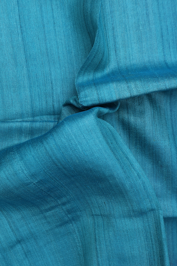 Tussar Silk Saree In Plain Blue With Contrast Border