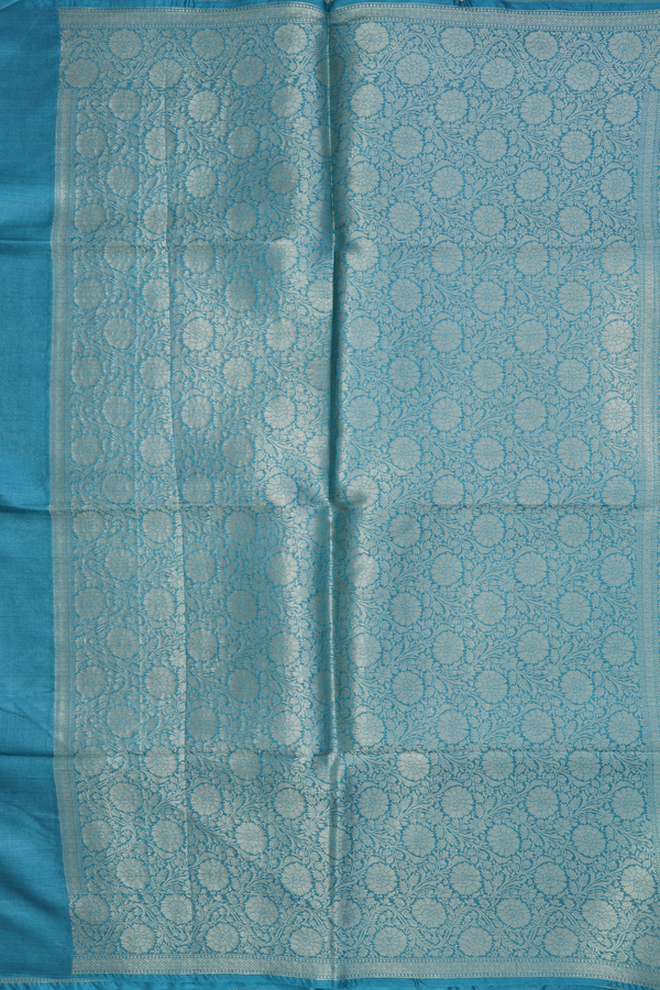 Tussar Silk Saree In Turkish Blue With Floral Buttas