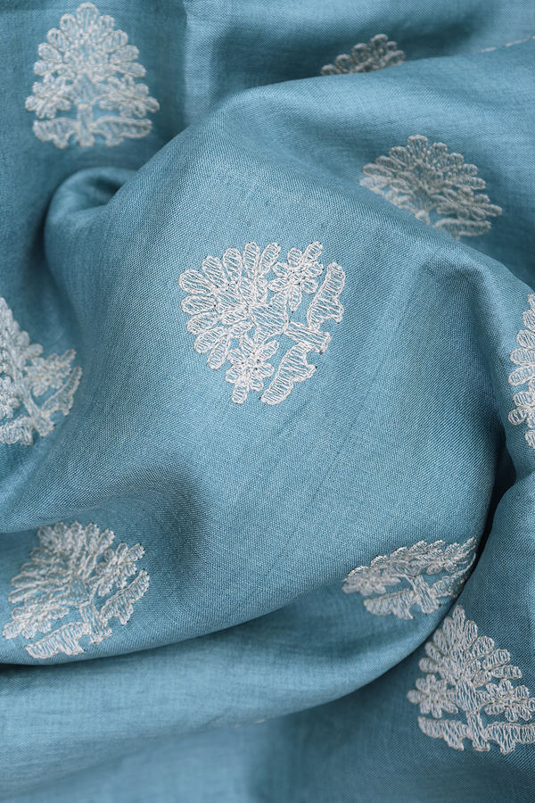 Tussar Silk Saree In Turkish Blue With Floral Buttas