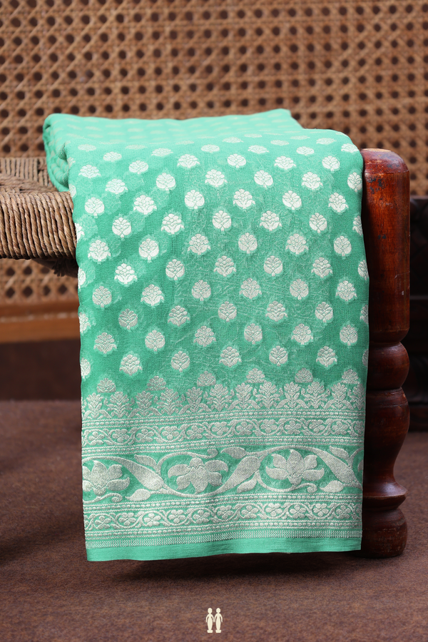 Georgette Banarasi Silk Saree In Green With Floral Buttas